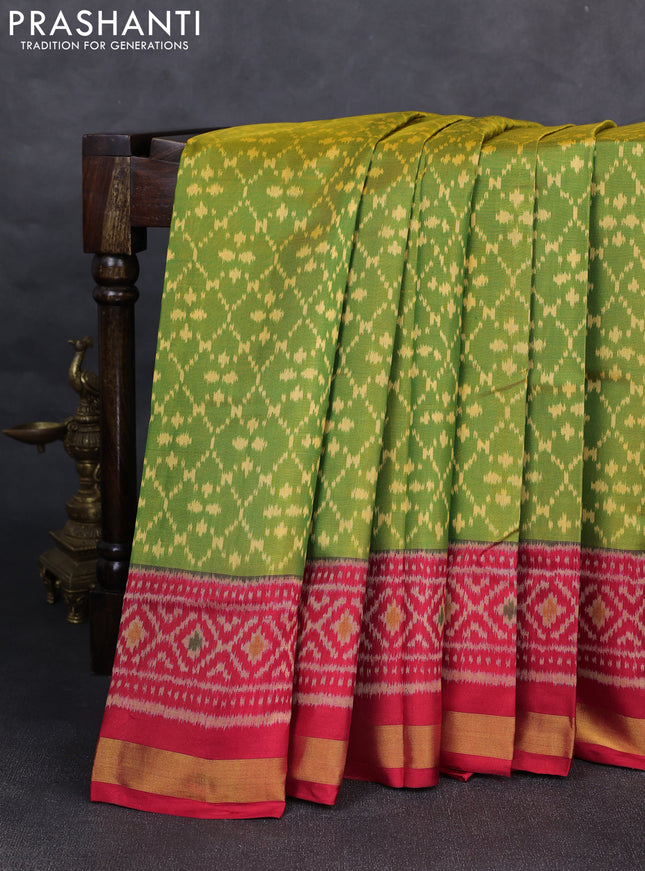 Rajkot patola silk saree green and kumkum red with allover ikat weaves and ikat woven zari border