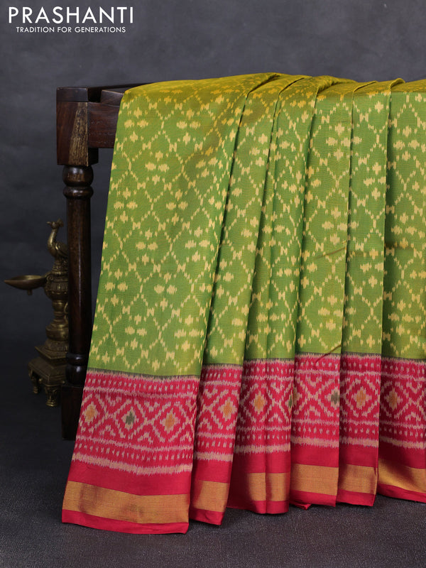 Rajkot patola silk saree green and kumkum red with allover ikat weaves and ikat woven zari border