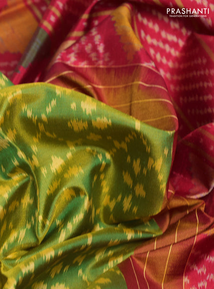 Rajkot patola silk saree green and kumkum red with allover ikat weaves and ikat woven zari border