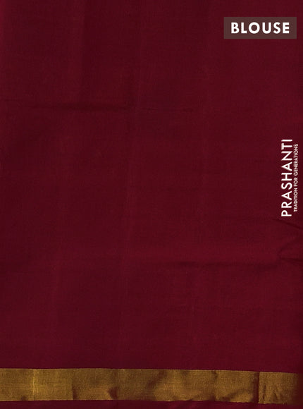 Rajkot patola silk saree green and kumkum red with allover ikat weaves and ikat woven zari border