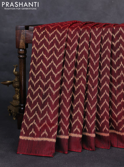 Rajkot patola silk saree maroon with allover zig zag ikat weaves & jute finish and ikat woven simple border