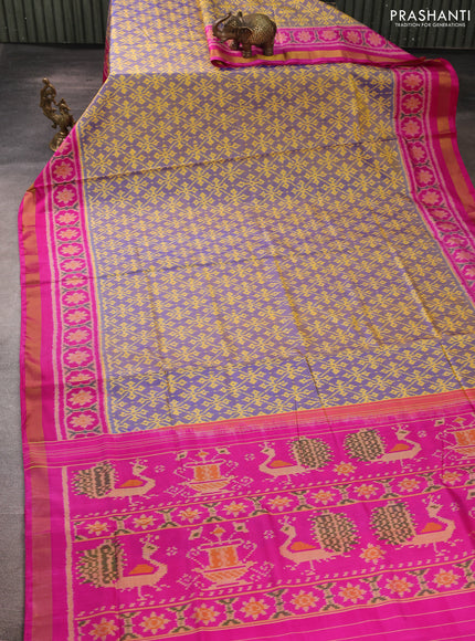 Rajkot patola silk saree dual shade of blue and pink with allover ikat weaves and ikat woven zari border