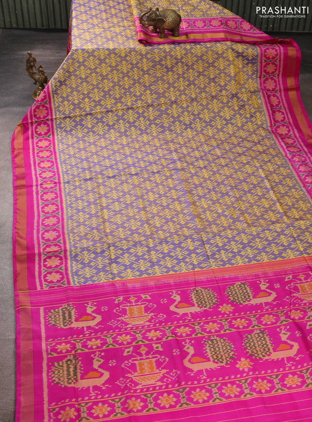 Rajkot patola silk saree dual shade of blue and pink with allover ikat weaves and ikat woven zari border
