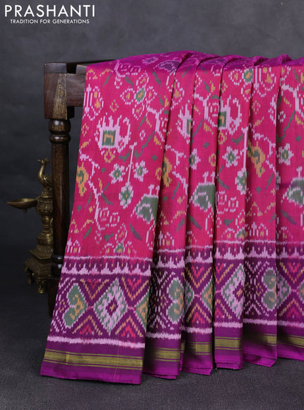 Rajkot patola silk saree pink and purple pink with ikat woven buttas and ikat woven zari border