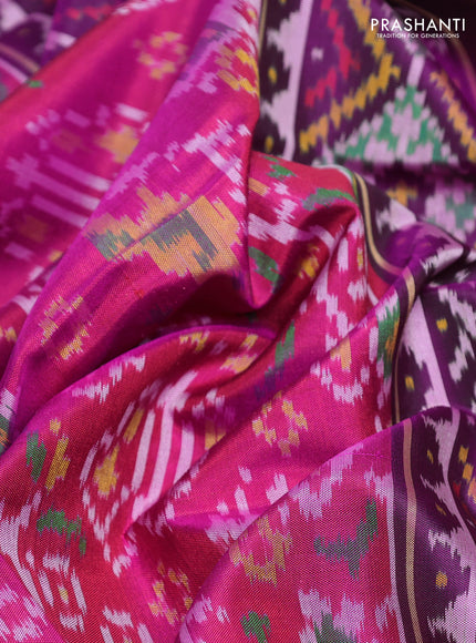 Rajkot patola silk saree pink and purple pink with ikat woven buttas and ikat woven zari border