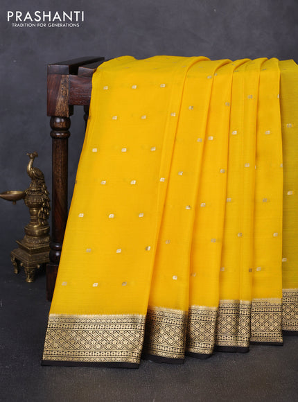 Pure mysore silk saree yellow and dark coffee brown with allover zari buttas and zari woven border