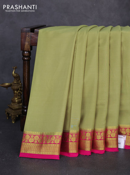 Pure mysore silk saree pista green and pink with plain body and zari woven border