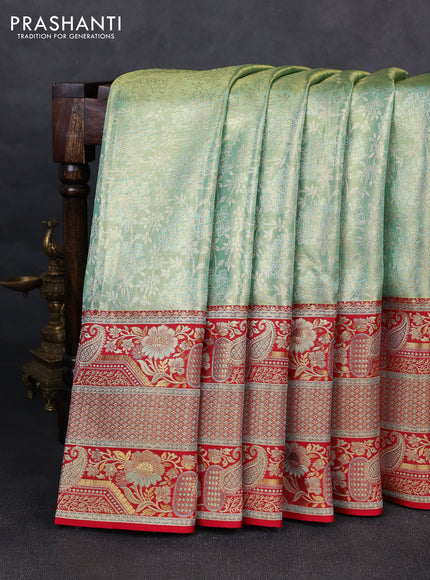 Pure kanchipuram tissue silk saree teal shade and red with allover zari woven brocade weaves and long floral zari woven border