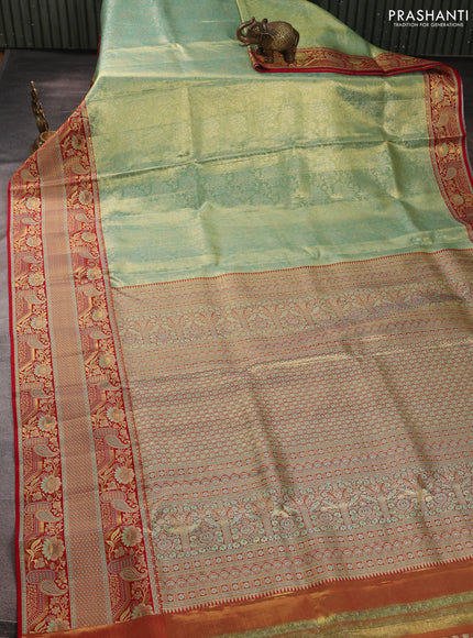 Pure kanchipuram tissue silk saree teal shade and red with allover zari woven brocade weaves and long floral zari woven border