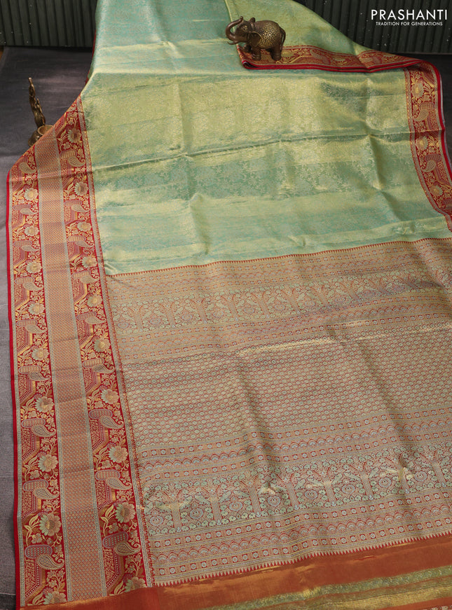Pure kanchipuram tissue silk saree teal shade and red with allover zari woven brocade weaves and long floral zari woven border