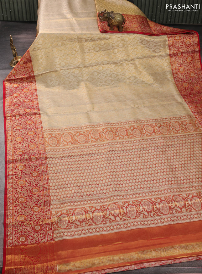Pure kanchipuram tissue silk saree sandal and red with allover zari woven brocade weaves and floral zari woven border