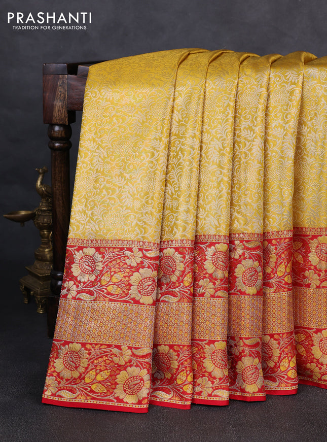 Pure kanchipuram tissue silk saree yellow and red with allover zari woven brocade weaves and long floral zari woven border