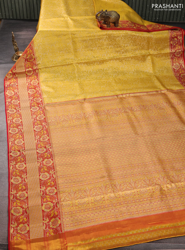 Pure kanchipuram tissue silk saree yellow and red with allover zari woven brocade weaves and long floral zari woven border