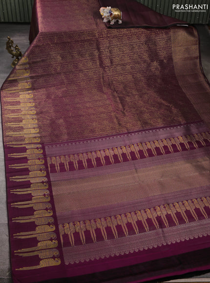 Pure kanchipuram silk saree wine shade with allover zari woven brocade weaves and parrot design zari woven border