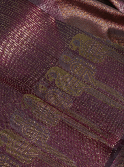 Pure kanchipuram silk saree wine shade with allover zari woven brocade weaves and parrot design zari woven border