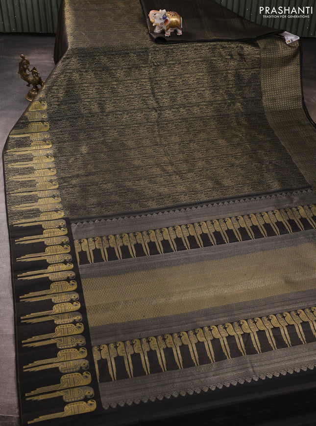 Pure kanchipuram silk saree black with allover zari woven brocade weaves and parrot design zari woven border