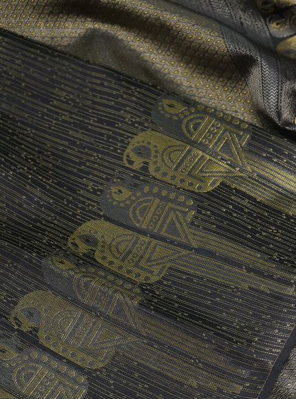 Pure kanchipuram silk saree black with allover zari woven brocade weaves and parrot design zari woven border