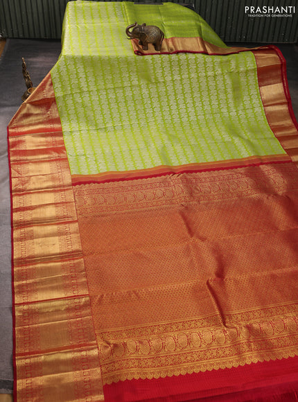 Pure kanchipuram silk saree fluorescent green and maroon with allover silver zari woven brocade weaves and long zari woven border