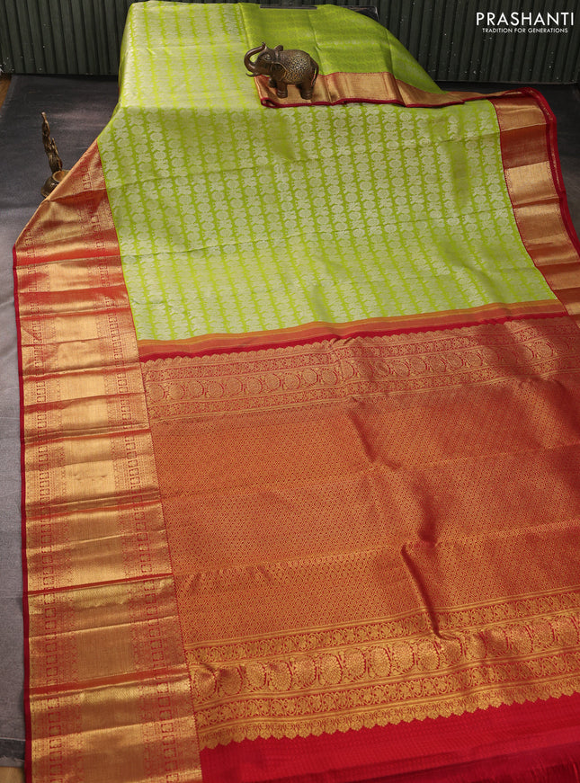 Pure kanchipuram silk saree fluorescent green and maroon with allover silver zari woven brocade weaves and long zari woven border
