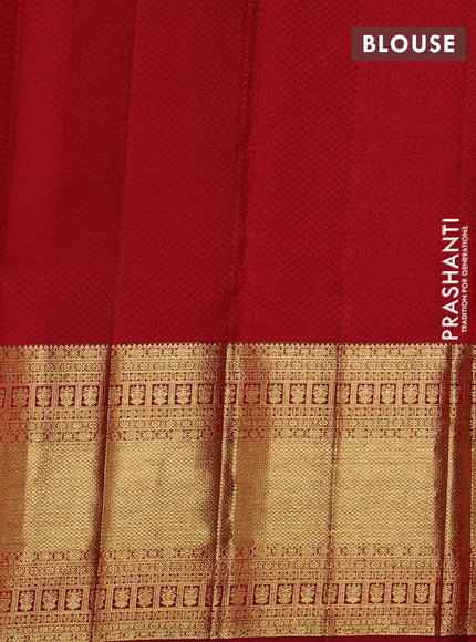 Pure kanchipuram silk saree fluorescent green and maroon with allover silver zari woven brocade weaves and long zari woven border