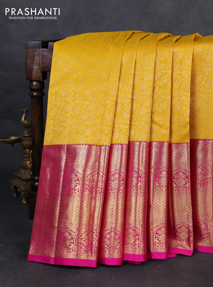 Pure kanchipuram silk saree mango yellow and pink with allover zari woven brocade weaves and long zari woven border