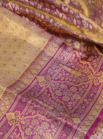 Pure kanchipuram tissue silk saree pastel peach and purple with allover zari woven brocade weaves and rich zari woven minakari border