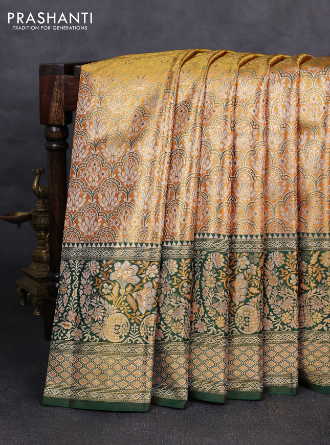 Pure kanchipuram tissuesilk saree orange and green with allover zari woven brocade weaves and rich zari woven minakari border