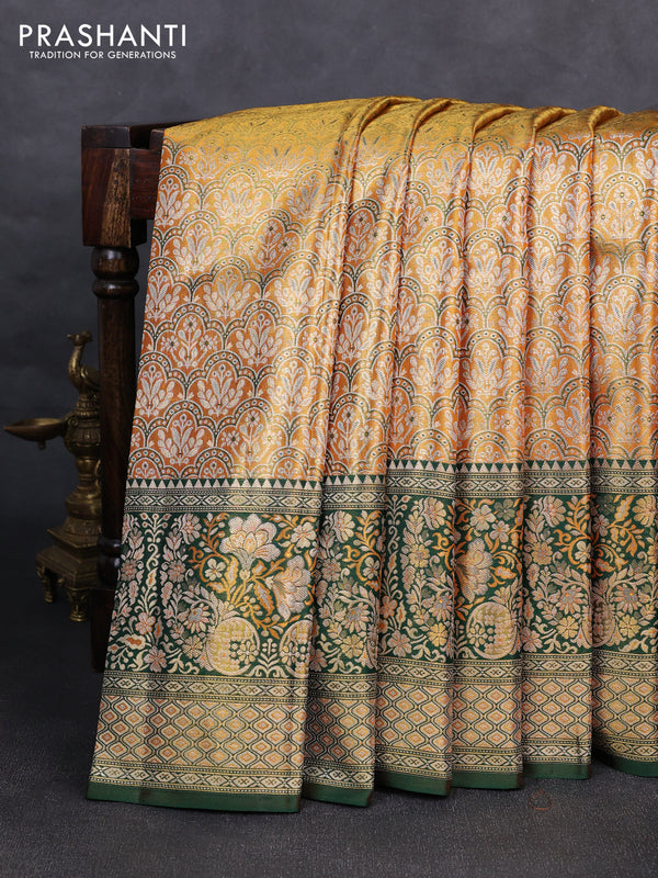 Pure kanchipuram tissuesilk saree orange and green with allover zari woven brocade weaves and rich zari woven minakari border