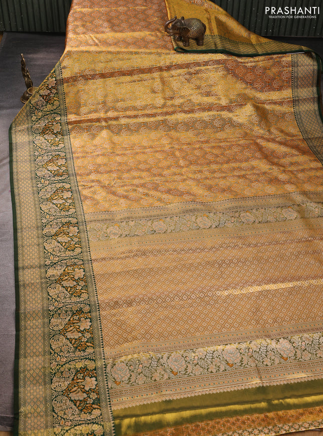 Pure kanchipuram tissuesilk saree orange and green with allover zari woven brocade weaves and rich zari woven minakari border