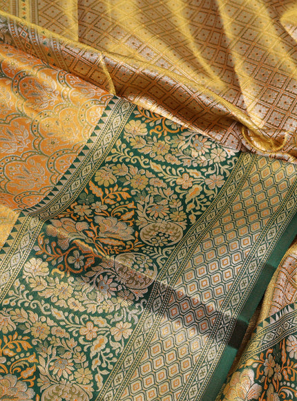 Pure kanchipuram tissuesilk saree orange and green with allover zari woven brocade weaves and rich zari woven minakari border