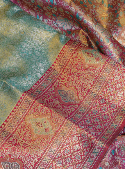 Pure kanchipuram tissue silk saree dual shade of teal green and pink with allover zari woven brocade weaves and rich zari woven minakari border