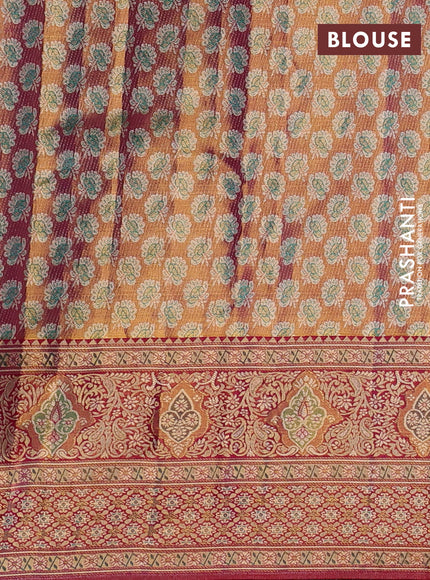 Pure kanchipuram tissue silk saree dual shade of teal green and pink with allover zari woven brocade weaves and rich zari woven minakari border