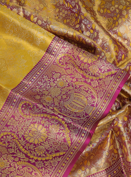 Pure kanchipuram silk saree yellow and purple with allover zari woven brocade weaves and rich zari woven minakari border