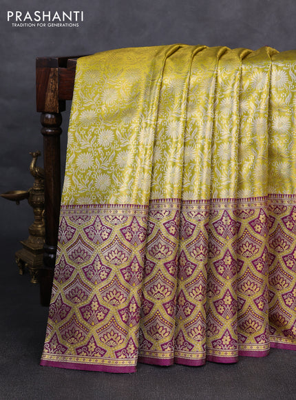 Pure kanchipuram tissue silk saree lime yellow and purple with allover zari woven brocade weaves and long zari woven minakari border