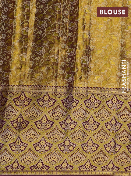 Pure kanchipuram tissue silk saree lime yellow and purple with allover zari woven brocade weaves and long zari woven minakari border