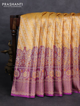Pure kanchipuram tissue silk saree yellow and purple with allover zari woven brocade weaves and long zari woven minakari border
