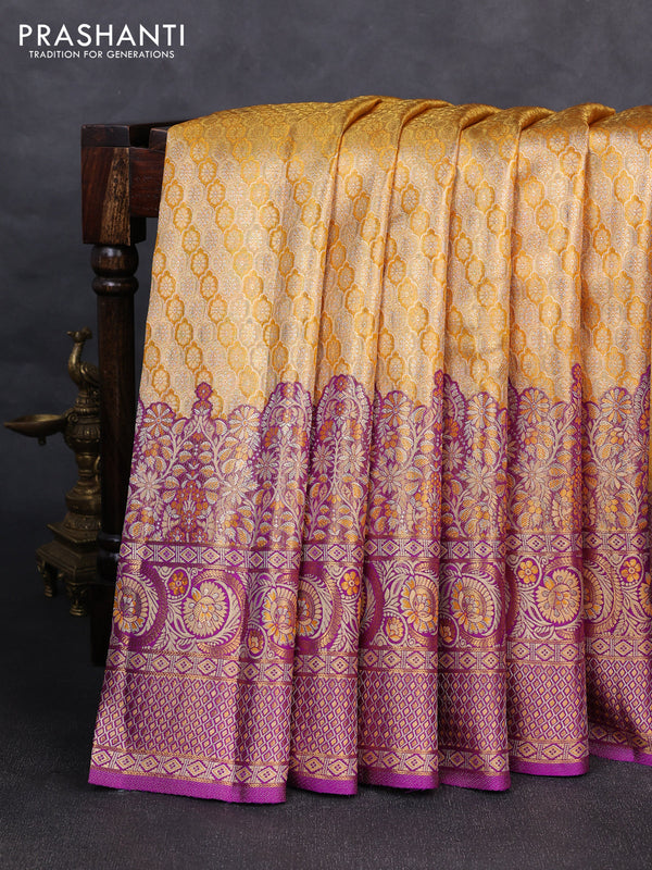 Pure kanchipuram tissue silk saree yellow and purple with allover zari woven brocade weaves and long zari woven minakari border