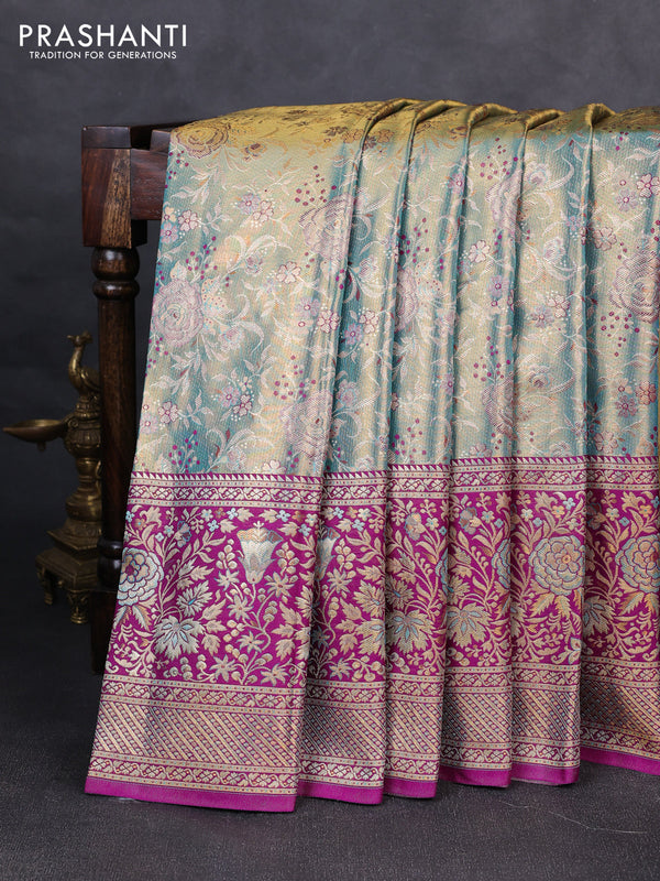 Pure kanchipuram tissue silk saree dual shade of teal blue and purple with allover zari woven brocade weaves and long zari woven minakari border