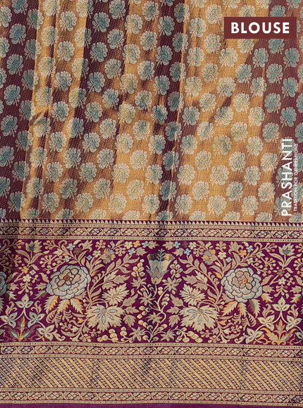 Pure kanchipuram tissue silk saree dual shade of teal blue and purple with allover zari woven brocade weaves and long zari woven minakari border