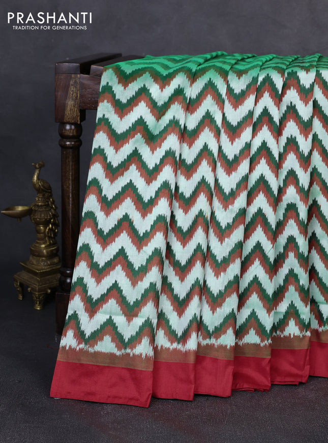 Pochampally silk saree green shade and red with allover ikat weaves and simple border