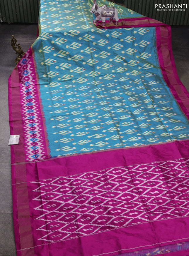 Pochampally silk saree blue shade and pink with allover ikat woven buttas and ikat zari woven border