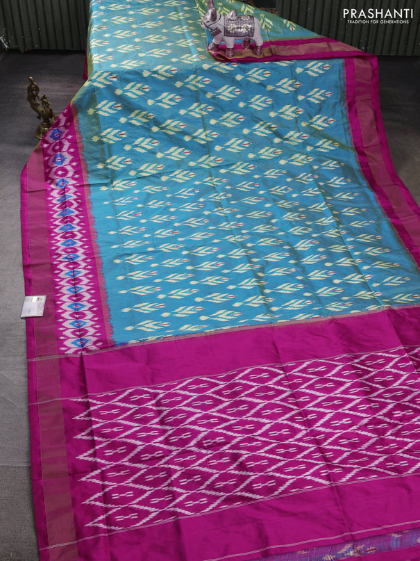 Pochampally silk saree blue shade and pink with allover ikat woven buttas and ikat zari woven border