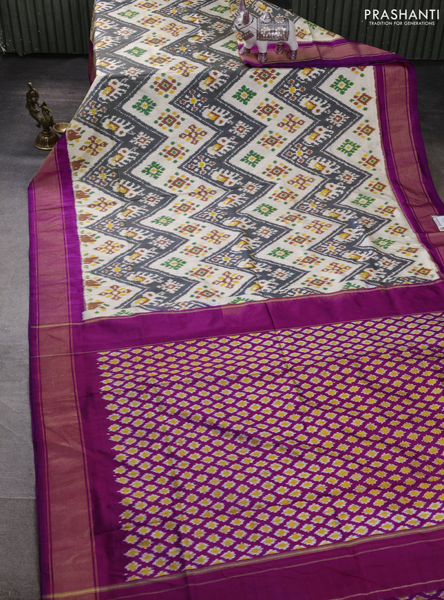 Pochampally silk saree cream and pink with allover ikat weaves and zari woven border