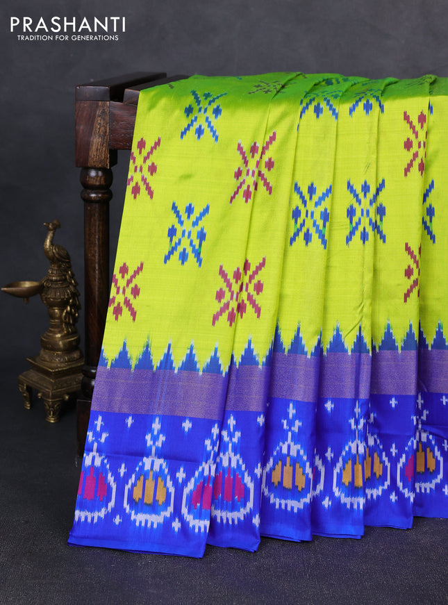 Pochampally silk saree fluorescent green and royal blue with allover ikat woven buttas and long zari ikat woven border