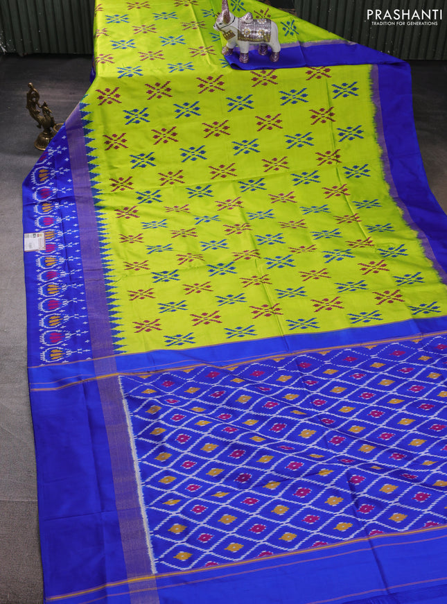 Pochampally silk saree fluorescent green and royal blue with allover ikat woven buttas and long zari ikat woven border