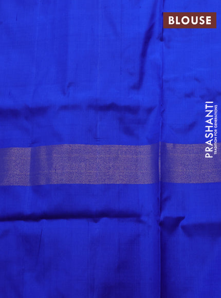 Pochampally silk saree fluorescent green and royal blue with allover ikat woven buttas and long zari ikat woven border