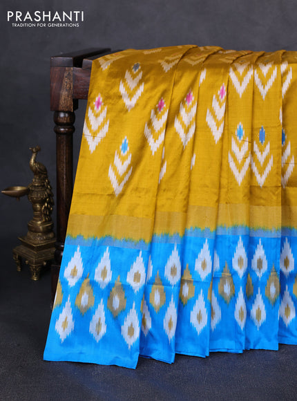 Pochampally silk saree mustard yellow and blue with allover ikat woven buttas and long zari ikat woven border
