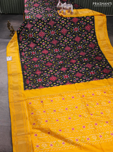 Pochampally silk saree black and mustard yellow with allover ikat weaves and zari woven border
