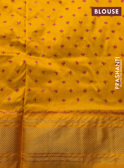 Pochampally silk saree black and mustard yellow with allover ikat weaves and zari woven border