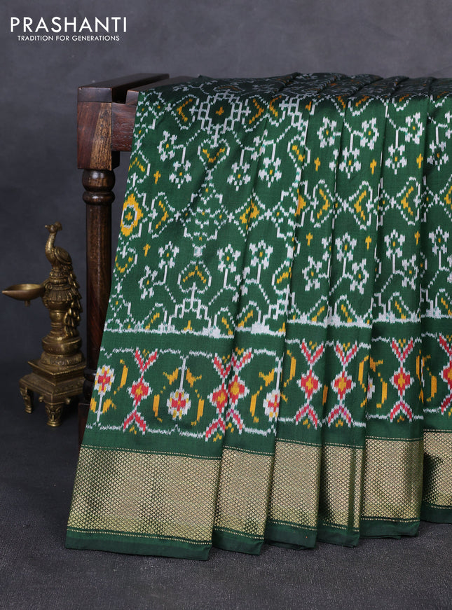 Pochampally silk saree bottle green with allover ikat weaves and zari woven border
